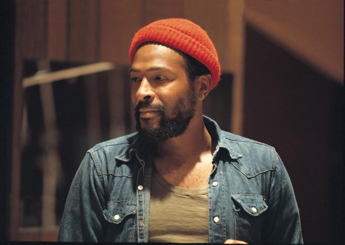 Marvin Gaye with a red beanie and blue denim shirt