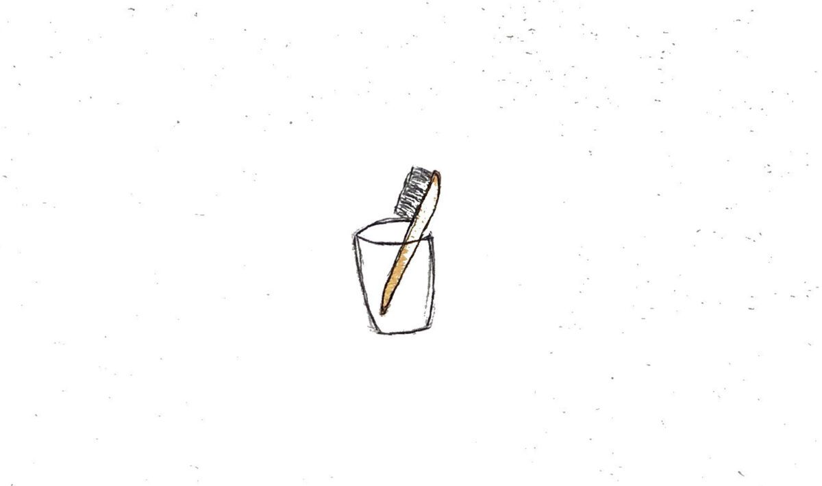 A minimalist drawing of a toothbrush.
