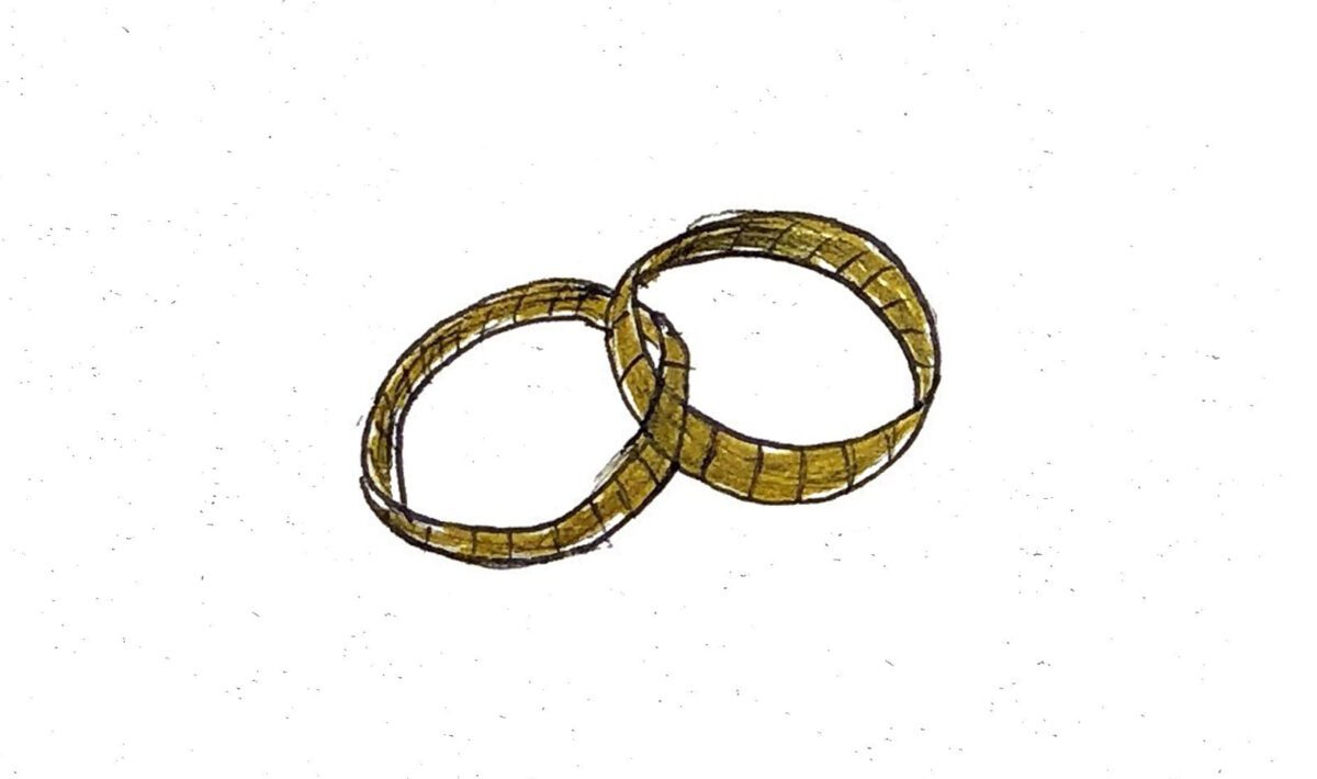A minimalist drawing of a pair of wedding rings.
